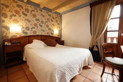 Cama o camas de una habitación en Hotel Villa de Torla