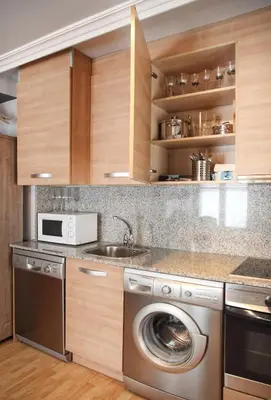 Una cocina o zona de cocina en Apartamentos Alcoba de Baco