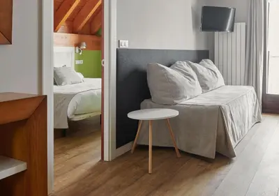 Cama o camas de una habitación en Apartahotel Tres Quiñones