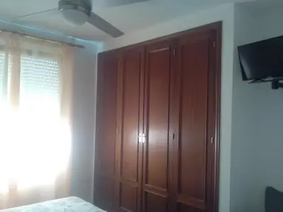 Una televisión o centro de entretenimiento en Hostal Restaurante el Cazador