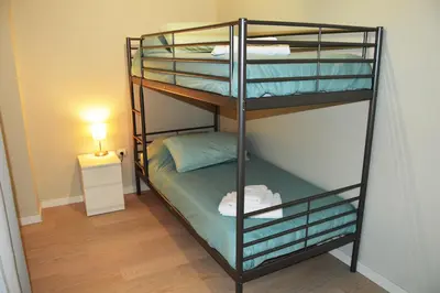 Cama o camas de una habitación en Apartamenticos Plaza del Pilar I