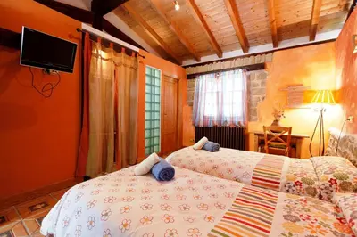 Cama o camas de una habitación en Alojamiento Rural La Cañada