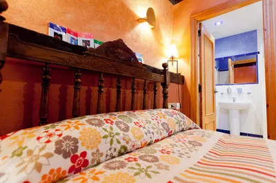 Cama o camas de una habitación en Alojamiento Rural La Cañada