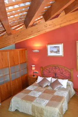 Cama o camas de una habitación en Ca la Trini Picotxa