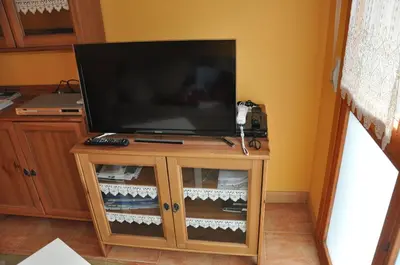 Una televisión o centro de entretenimiento en Apartamento en Isaba (NAVARRA)