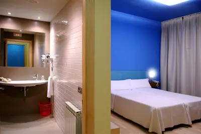 Cama o camas de una habitación en La Merced de la Concordia