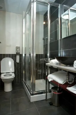 Un baño de Arcohotel