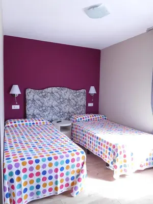 Cama o camas de una habitación en Hotel Restaurante Las Galias