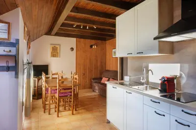 Una cocina o zona de cocina en El Rincón de Andrea Apartamentos