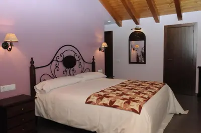 Cama o camas de una habitación en Allotjament Rural La Comella