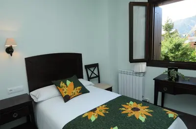 Cama o camas de una habitación en Allotjament Rural La Comella