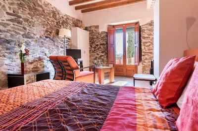 Cama o camas de una habitación en Hotel Cal Llop