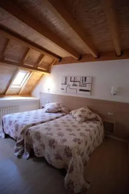 Cama o camas de una habitación en Casa de los Beneficiados