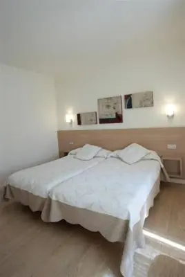 Cama o camas de una habitación en Casa de los Beneficiados