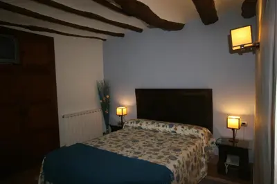 Cama o camas de una habitación en La Casona del Solanar