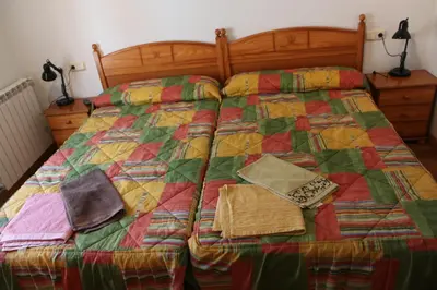 Cama o camas de una habitación en Hostal La Plaza