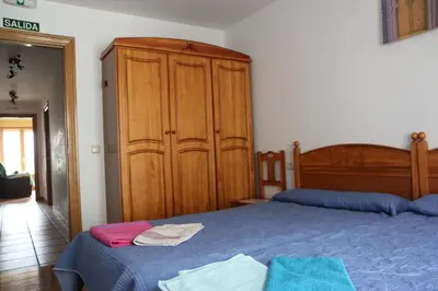 Cama o camas de una habitación en Hostal La Plaza