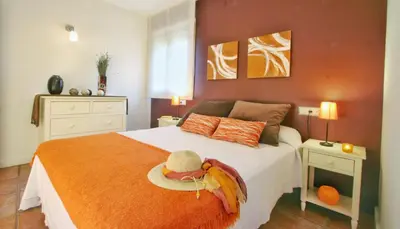 Cama o camas de una habitación en Apartamentos Uncastillo