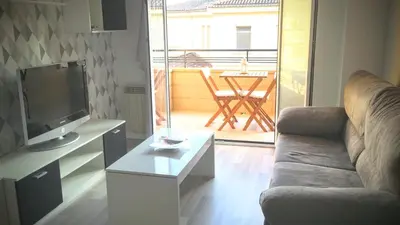 Una televisión o centro de entretenimiento en Apartamento 