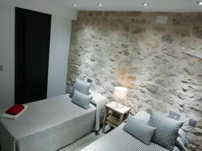 Cama o camas de una habitación en Los Ángeles Valderrobres