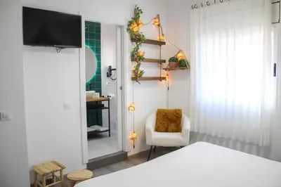 Cama o camas de una habitación en Hotel Pepo
