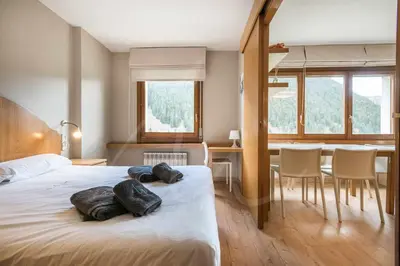 Cama o camas de una habitación en Solneu by SeaMount Rentals