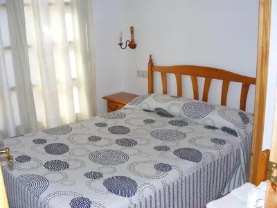 Cama o camas de una habitación en Apartaments l'Arrel