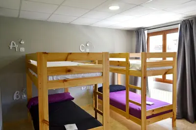 Cama o camas de una habitación en Alda Estella Hostel