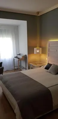 Cama o camas de una habitación en La Parada