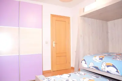 Cama o camas de una habitación en Apartamento céntrico con WIFI en Biescas