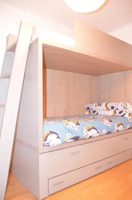 Cama o camas de una habitación en Apartamento céntrico con WIFI en Biescas