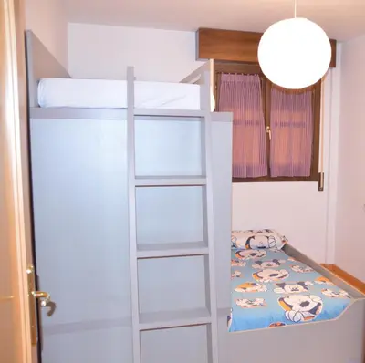 Cama o camas de una habitación en Apartamento céntrico con WIFI en Biescas