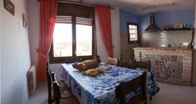 Cama o camas de una habitación en Apartamentos rurales La posada de Donato