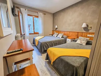 Cama o camas de una habitación en Hotel Casa Morlans 3000