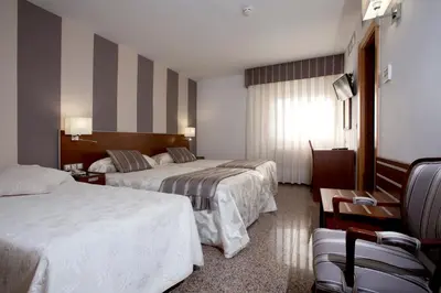 Cama o camas de una habitación en Hotel Marivella