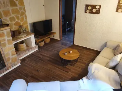 Una televisión o centro de entretenimiento en Casa Marèlia, Costa Daurada Rural