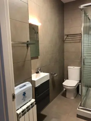 Un baño de Apartamentos Villava Pamplona