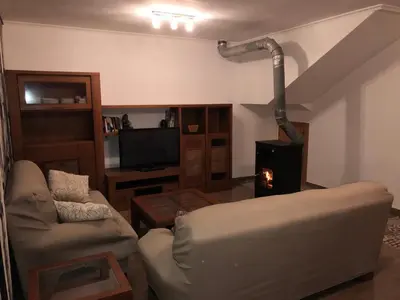 Una televisión o centro de entretenimiento en CASA RURAL CASCO ANTIGUO