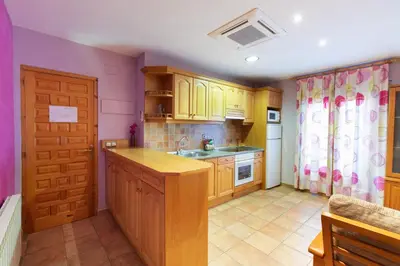 Una cocina o zona de cocina en Apartamentos Cinca