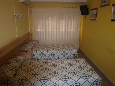 Cama o camas de una habitación en Hostal San Jorge