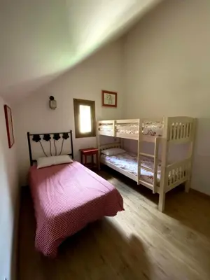 Cama o camas de una habitación en Hoz de Jaca, Casa Mas Mañanas.