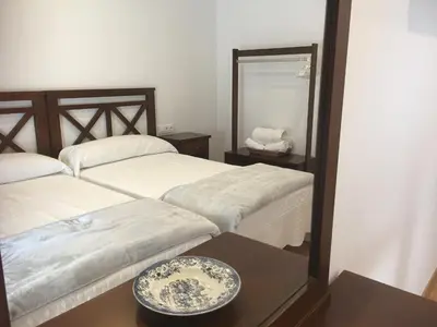 Cama o camas de una habitación en La Casa del Hilario