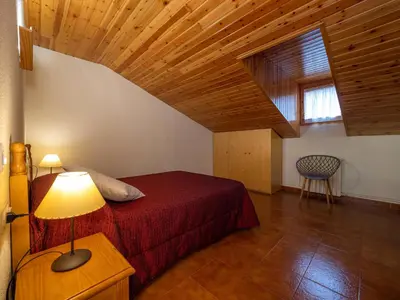 Cama o camas de una habitación en Casa rural Quintana - Montanuy