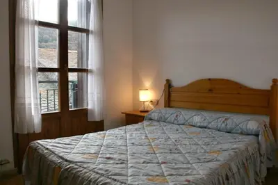 Cama o camas de una habitación en Ramonet