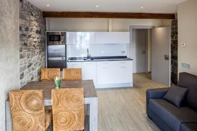 Una cocina o zona de cocina en Apartamentos Casa Ríos