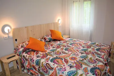 Cama o camas de una habitación en B&B LOS LLANOS