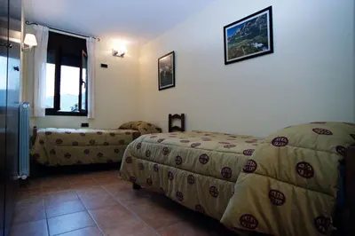 Cama o camas de una habitación en Apartamentos Les Picardes