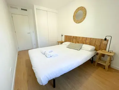 Cama o camas de una habitación en VTZ El Balcón a la Basílica III - en plena Plaza del Pilar!