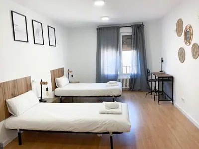 Cama o camas de una habitación en VTZ El Balcón a la Basílica III - en plena Plaza del Pilar!