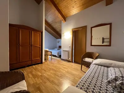 Cama o camas de una habitación en Hostal Rural Salazar